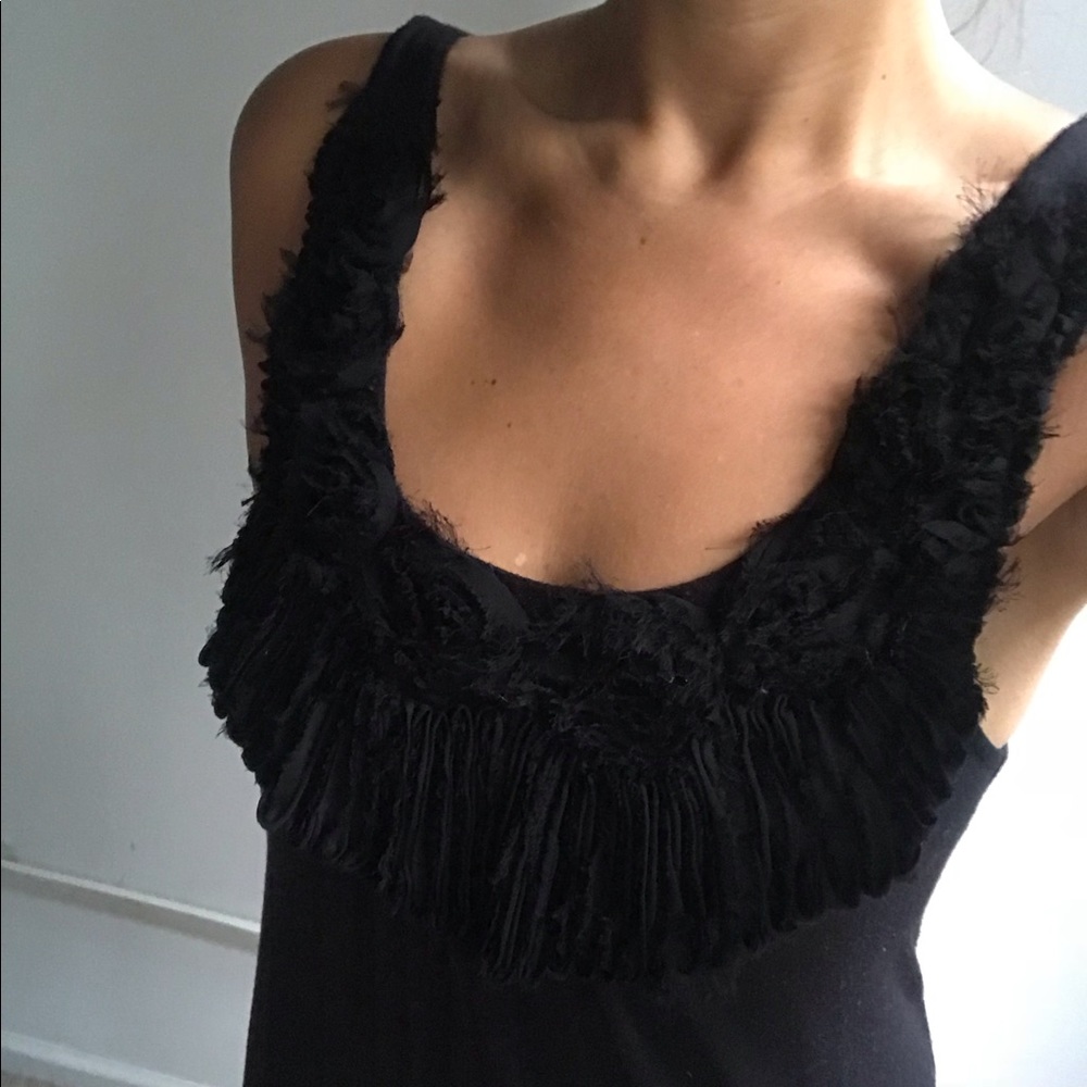 Ruched-top black dress with cinch-bottom